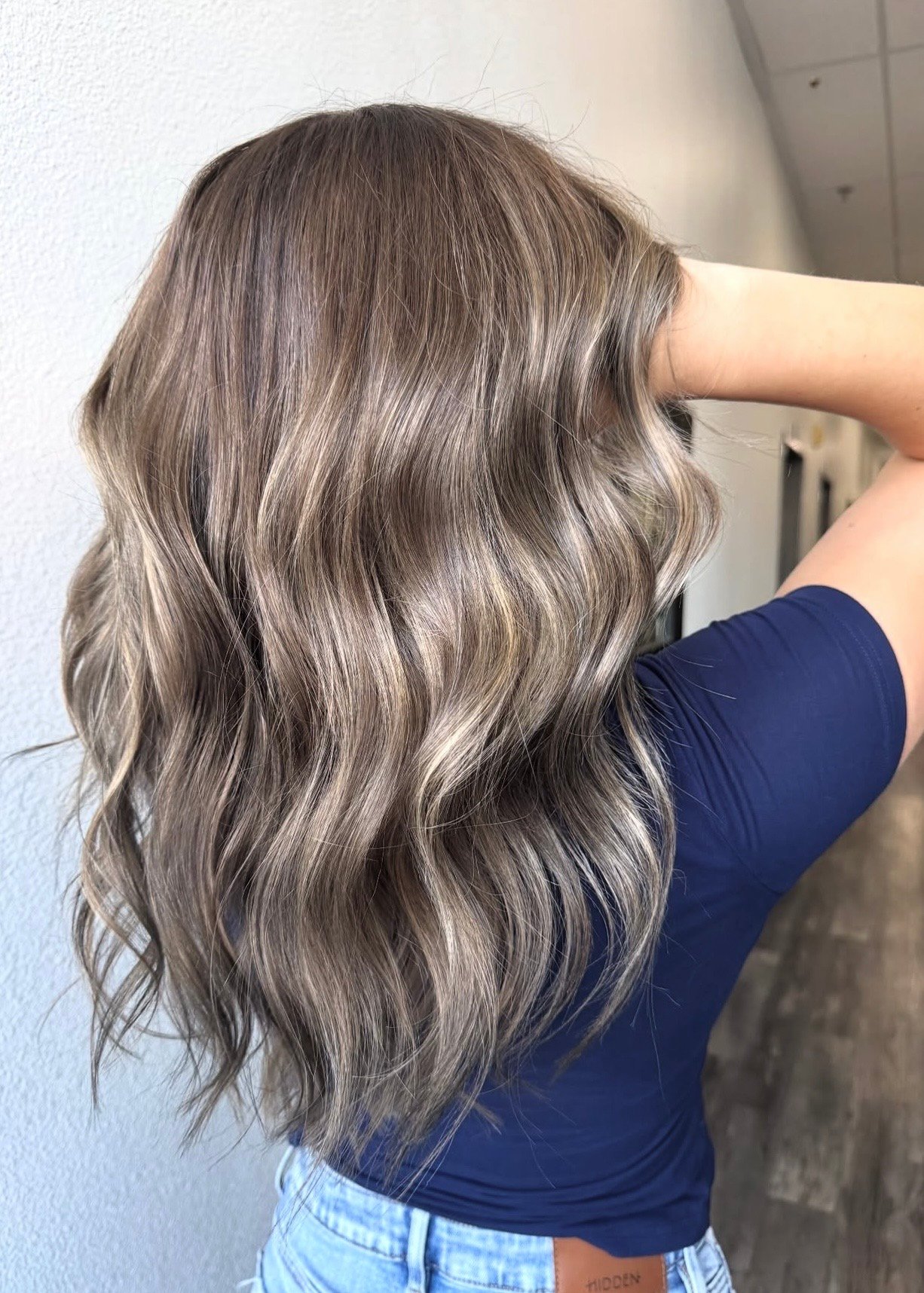 Ash-blonde balayage with soft waves